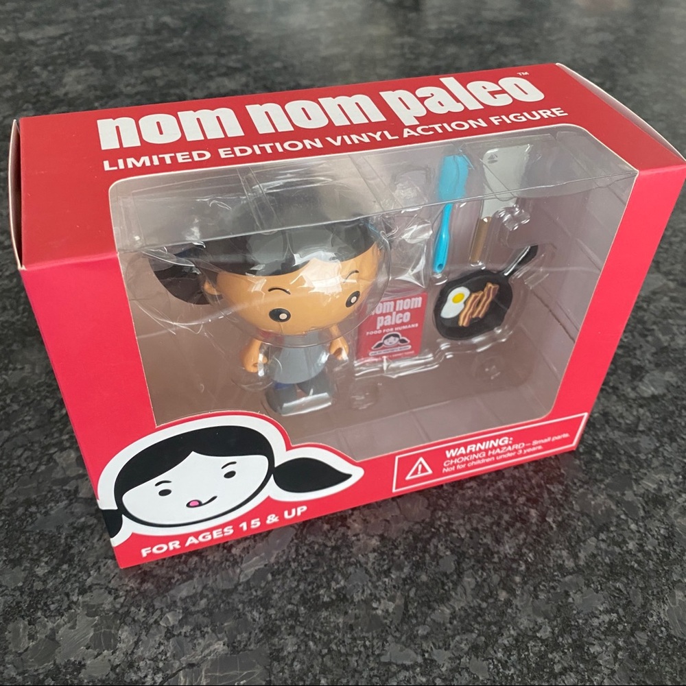 nom nom paleo action figure.  New in box.